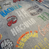ALLOVER LOGO JEANS