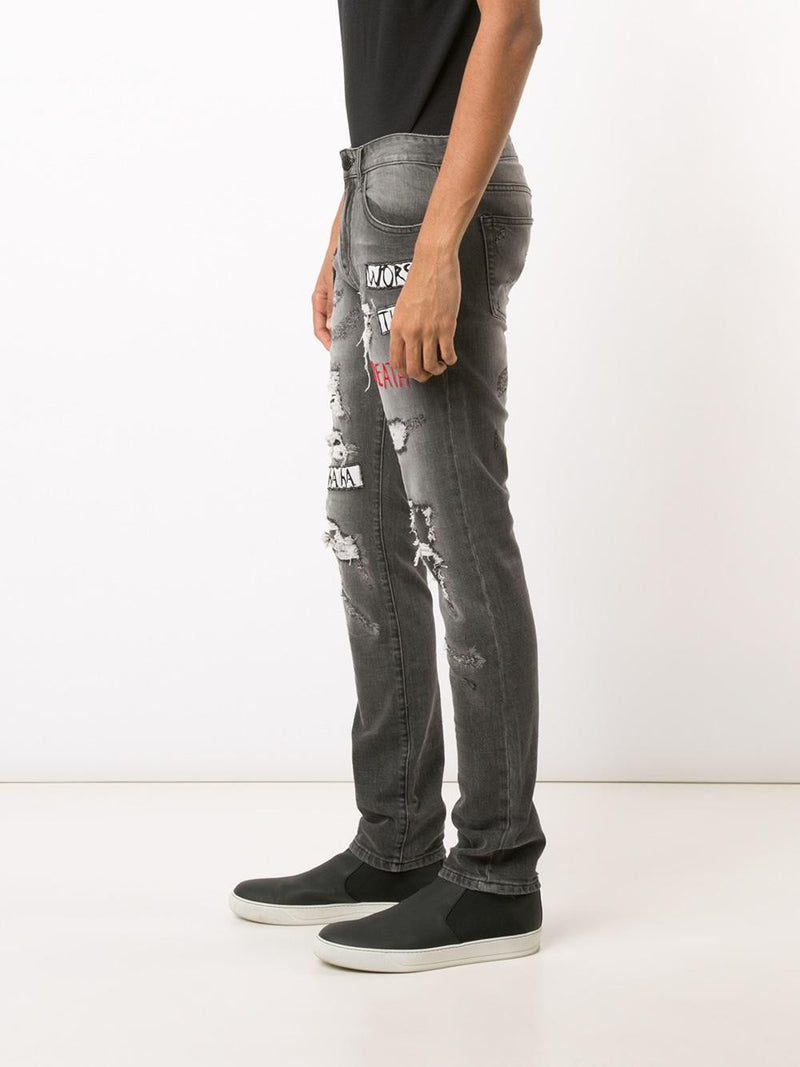 PATCHWORK DISTRESSED JEANS